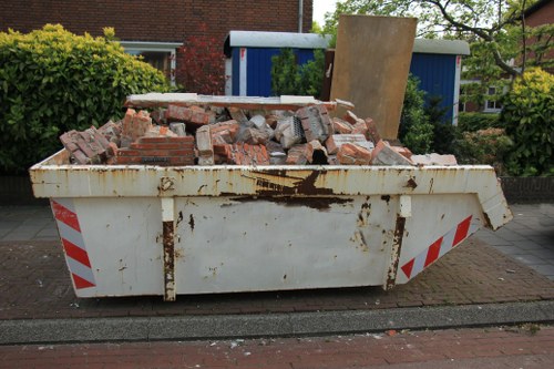 Professional team clearing a home in Havering